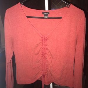 if you pull the strings, it will make it tighter.